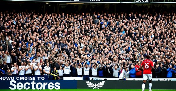 What strategies are used to enhance fan experience in UK sports?